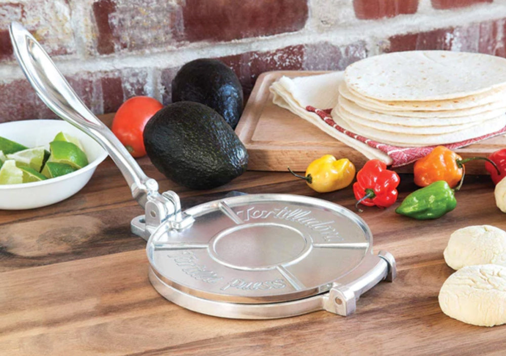 how to get perfectly round tortillas How to Get Perfectly Round Tortillas with a Cast Iron Press
